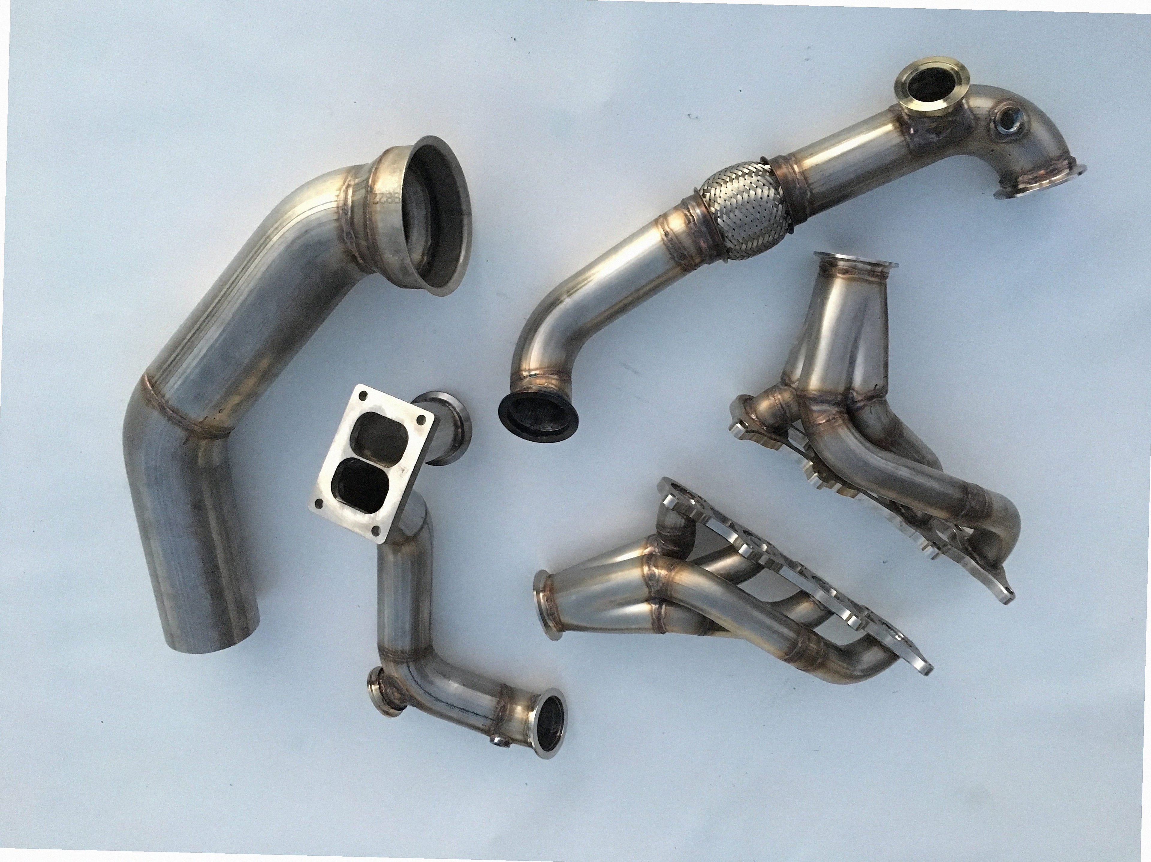 Coyote Swap TO6 Turbo Race Kit — passenger-side header with V-band flange and merge collector