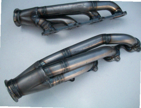 4.6 4V Modular / Fox Body Headers — complete turbo hot-side kit with mild steel tubular headers, crossover pipe with flex bellow, starter downpipe, and turbo mount flange