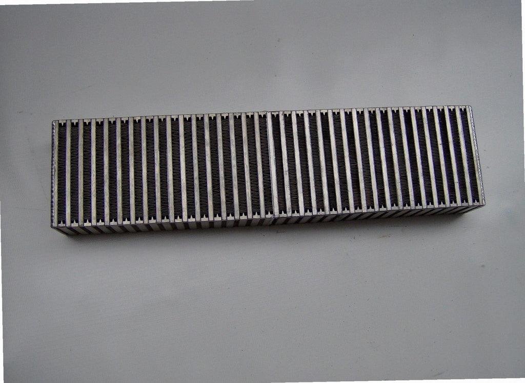 Custom Air-to-Air IC 3 1/2" — passenger-side header with V-band flange and merge collector