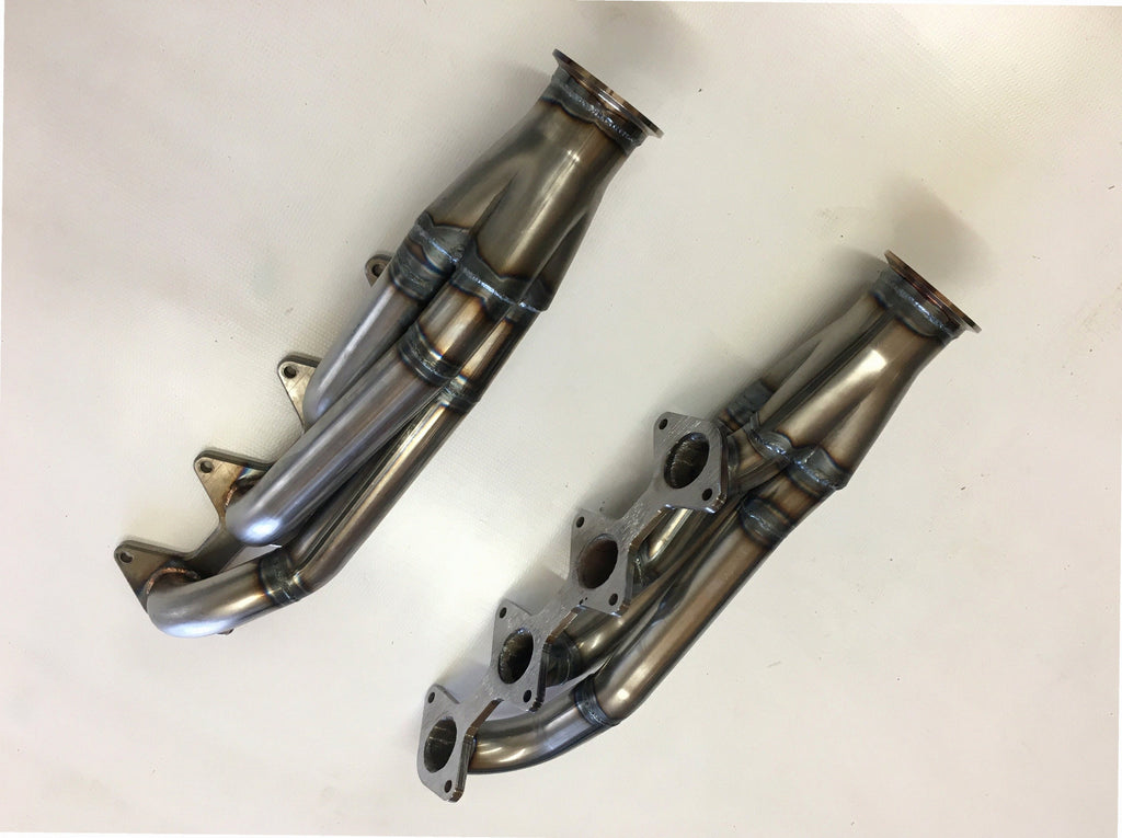5.4 3 V Facing Forward Headers — detail view of merge collector, flex bellow joint, and V-band connection