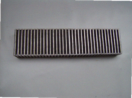 L S - 1 Intercooler — fabricated aluminum bar-and-plate intercooler core with TIG-welded end tanks