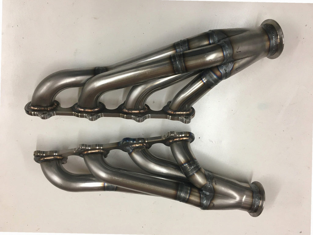 4.6 4V Motor Plate Headers — facing-forward tubular turbo headers in mild steel with V-band flanges and CNC head flanges