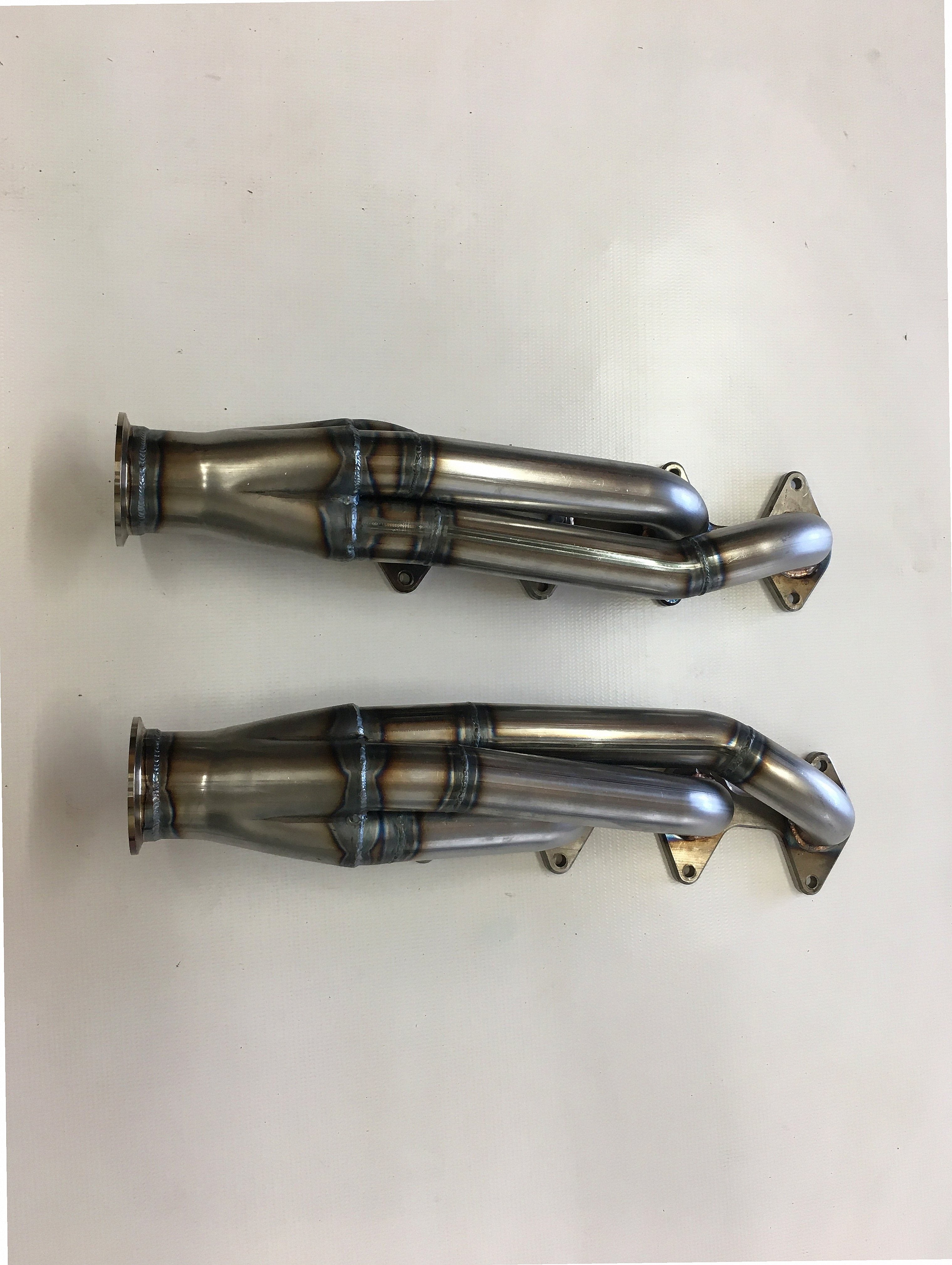 5.4 3 V Facing Forward Headers — passenger-side header with V-band flange and merge collector