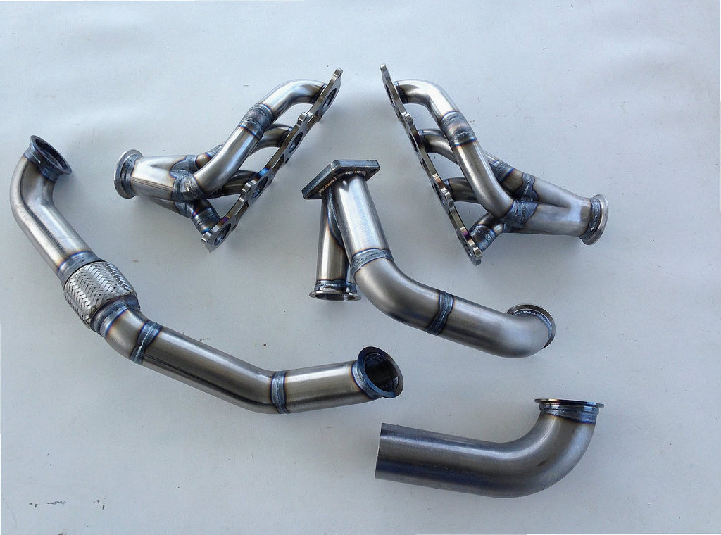 Coyote Turbo Swap Driver Side Street/Drag Kit — detail view of merge collector, flex bellow joint, and V-band connection