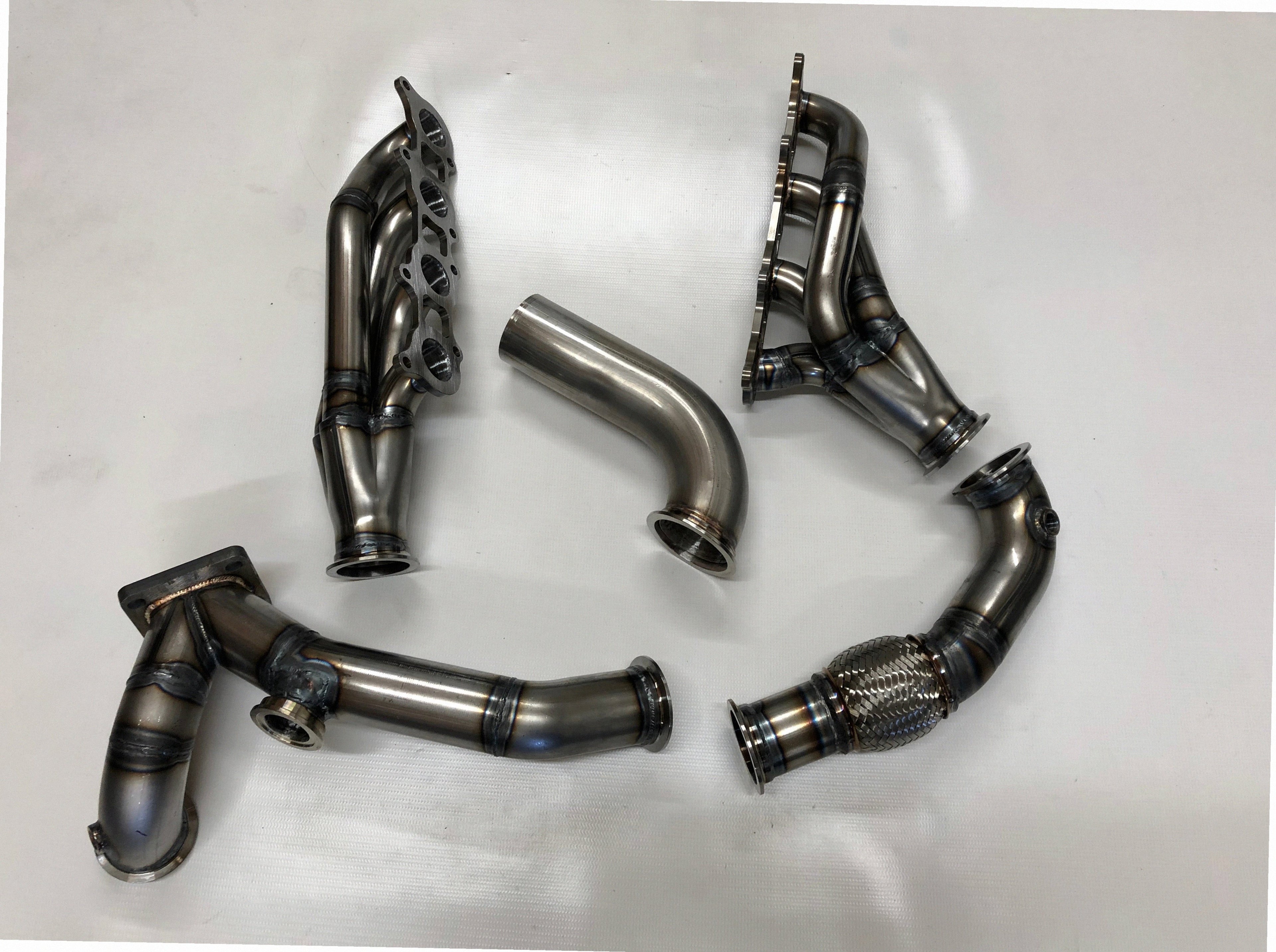 Coyote Turbo Swap Passenger Side Street/Drag Kit — complete turbo hot-side kit with mild steel tubular headers, crossover pipe with flex bellow, starter downpipe, and turbo mount flange