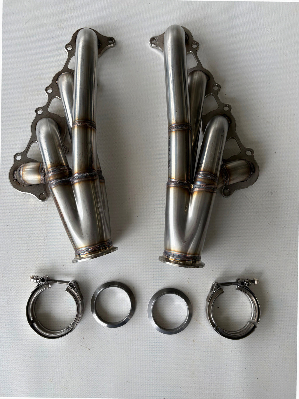 Coyote Swap Turbo Headers Up — passenger-side header with V-band flange and merge collector