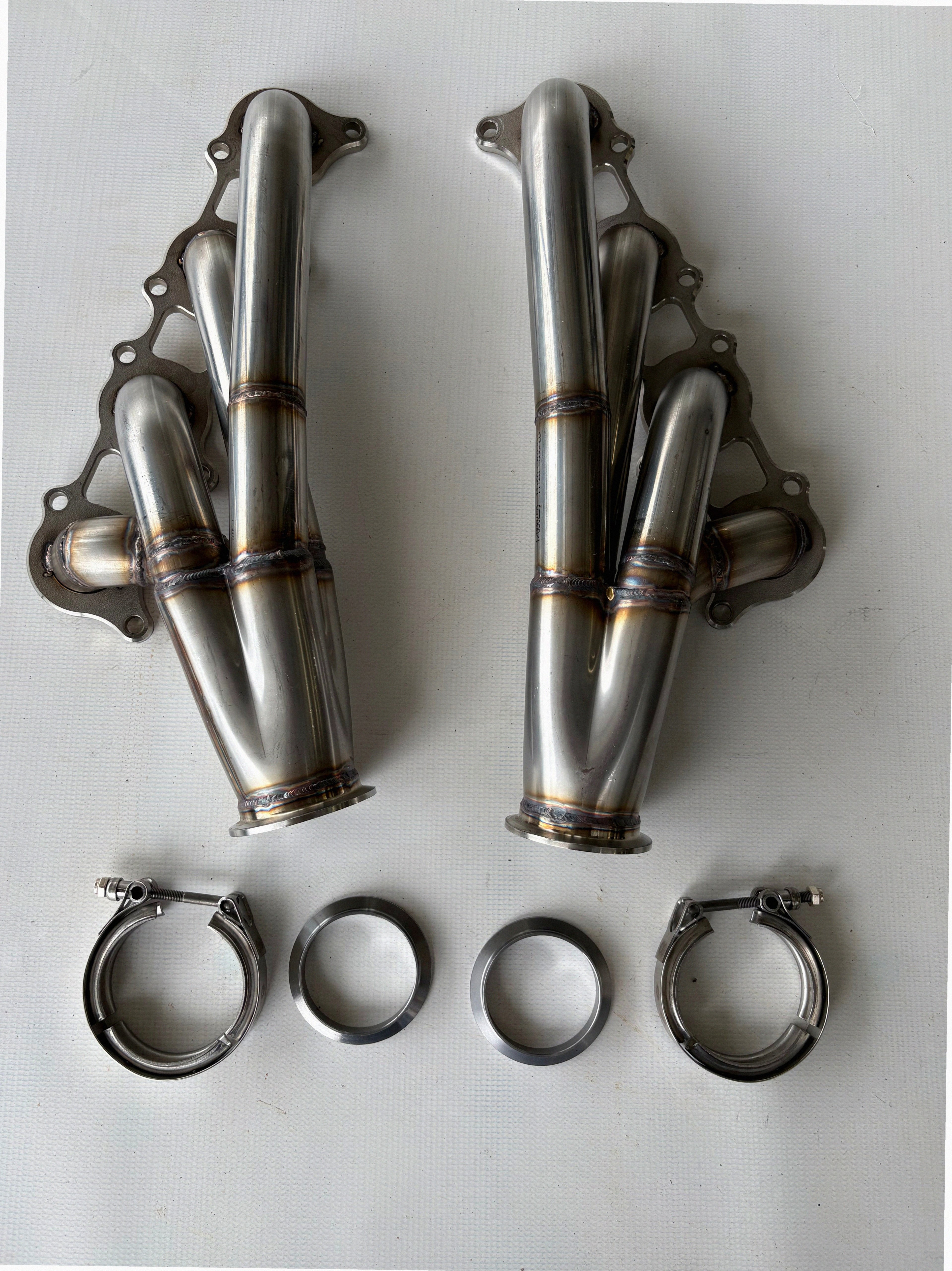 Coyote Swap Turbo Headers Up — passenger-side header with V-band flange and merge collector