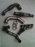 Lightning Turbo Race Kit — complete turbo hot-side kit with mild steel tubular headers, crossover pipe with flex bellow, starter downpipe, and turbo mount flange