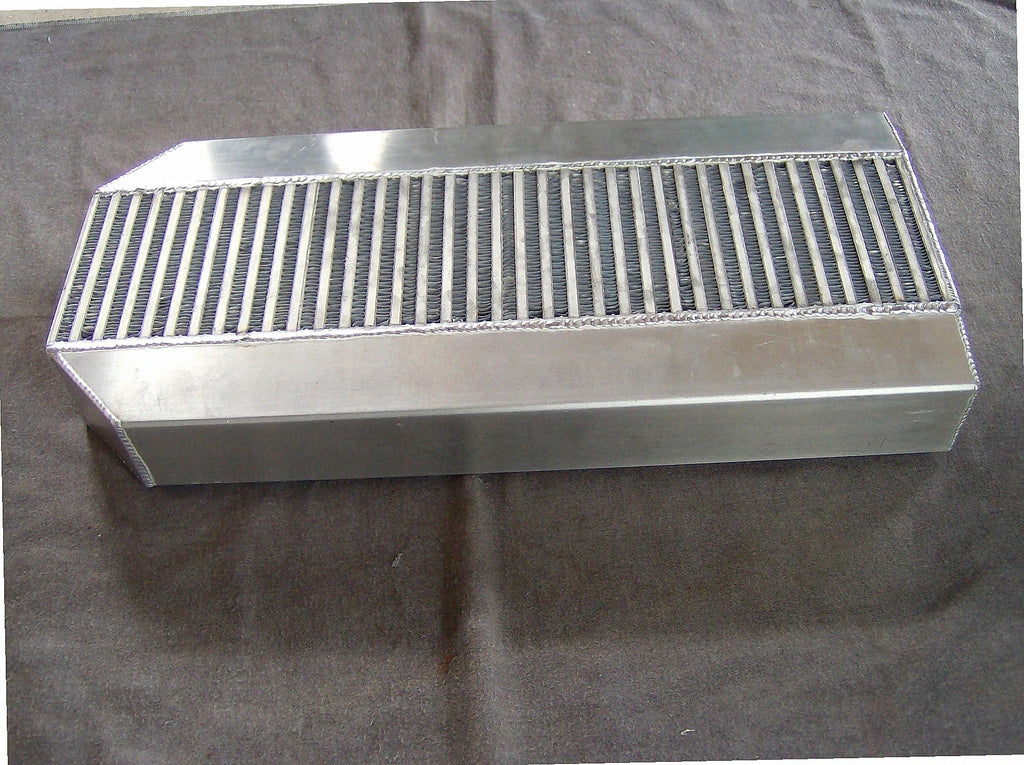 Custom Air-to-Air IC 3" — passenger-side header with V-band flange and merge collector