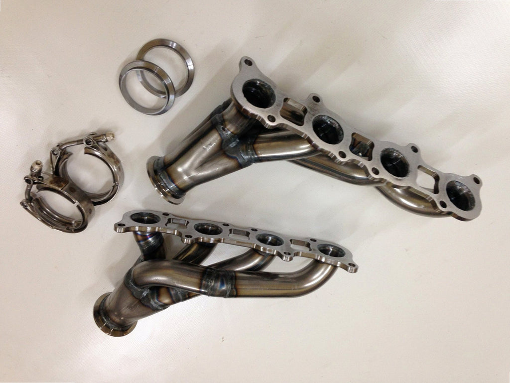 Coyote Swap Turbo Headers — detail view of merge collector, flex bellow joint, and V-band connection