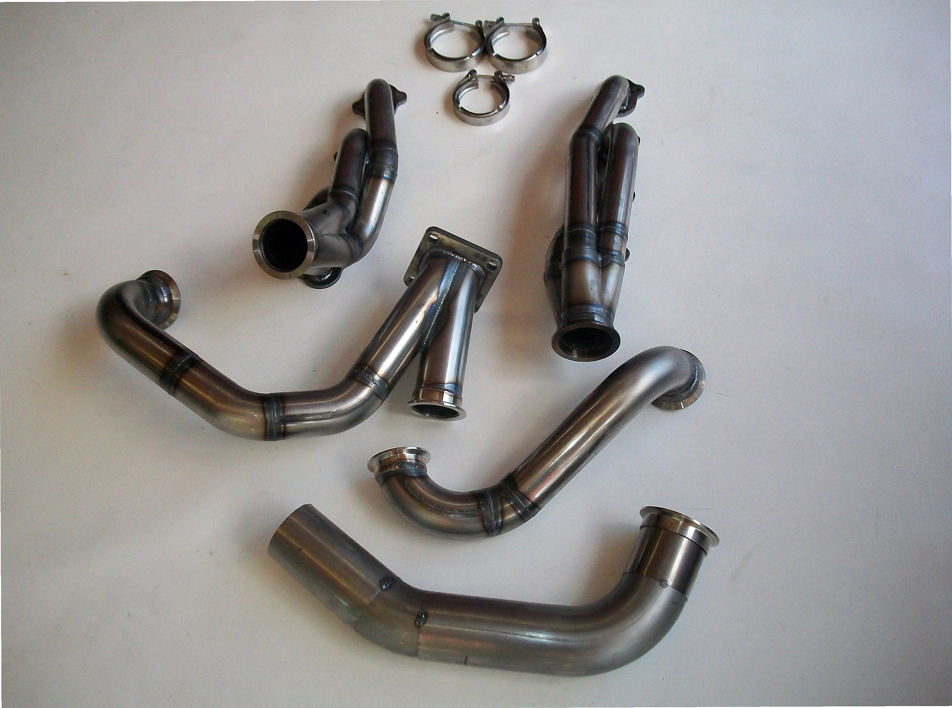 4.6 4V Turbo Street / Drag Kit — complete turbo hot-side kit with mild steel tubular headers, crossover pipe with flex bellow, starter downpipe, and turbo mount flange