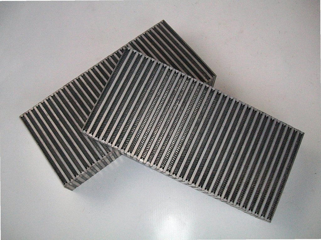 Custom Intercooler 1300 HP — TIG-welded aluminum end tank with charge pipe stubs