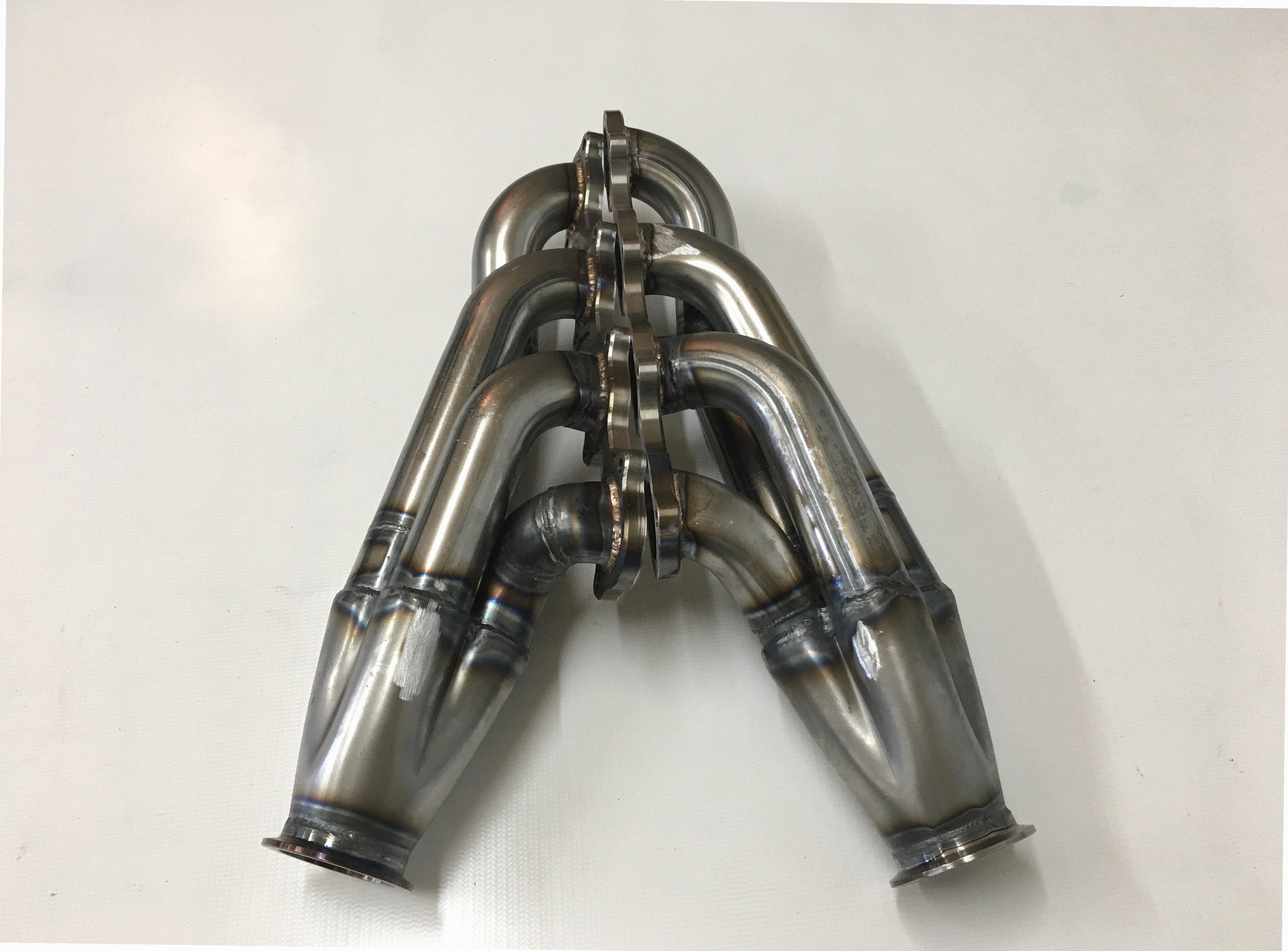 GT500 Turbo Headers Swap/Motor Plates — facing-forward tubular turbo headers in mild steel with V-band flanges and CNC head flanges