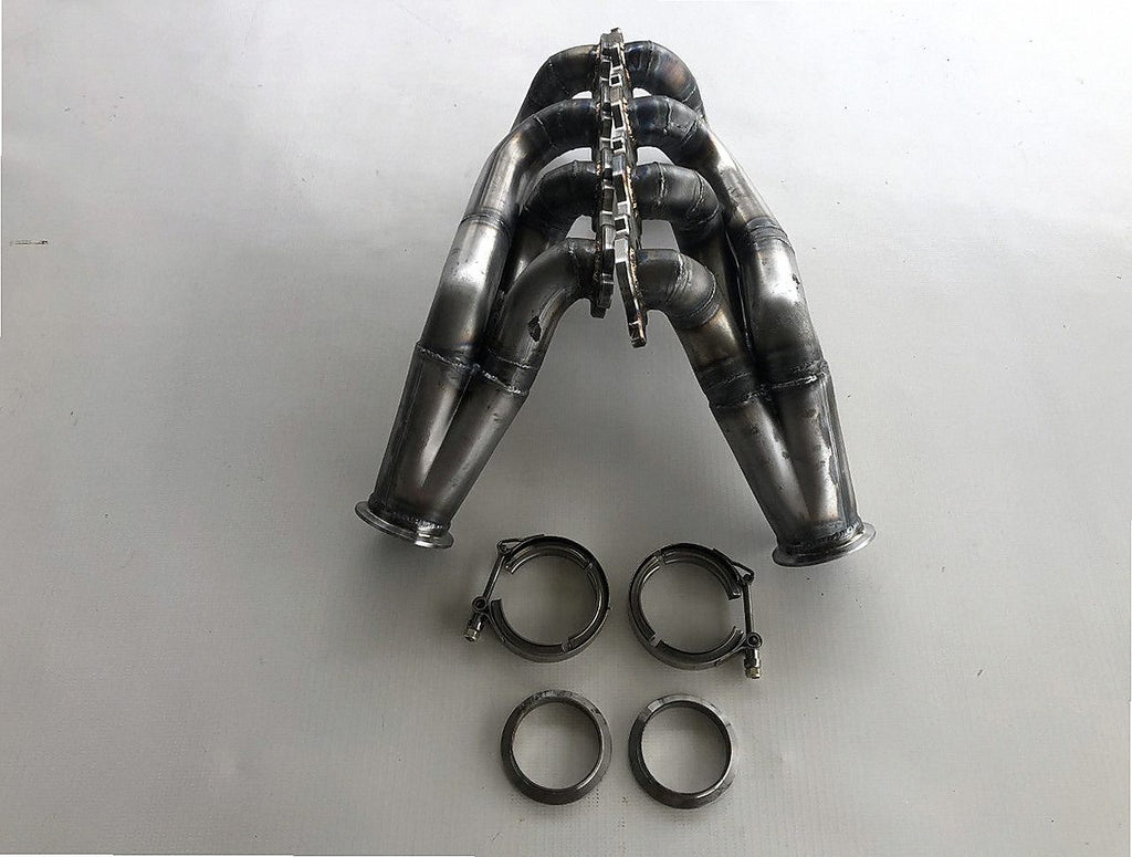 7.3 Godzilla Swap Turbo Headers — detail view of merge collector, flex bellow joint, and V-band connection
