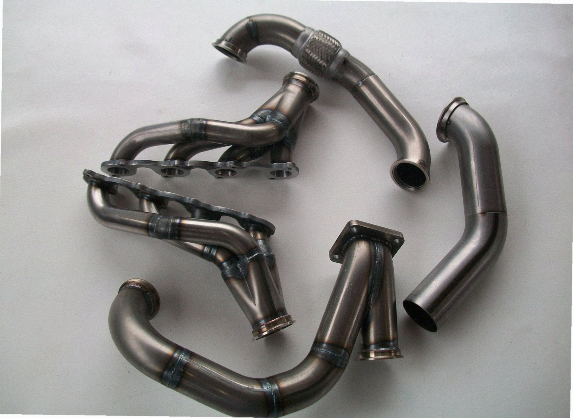 4.6 2V Turbo Fox Body Race Kit — passenger-side header with V-band flange and merge collector