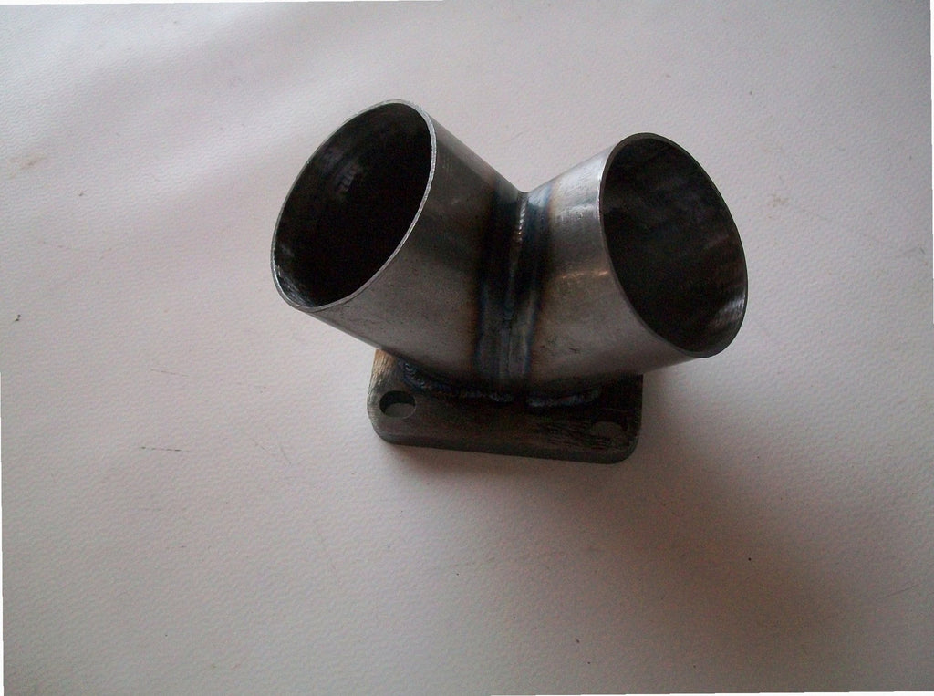 TO4 Turbo Mount Flange — CNC-machined stainless steel turbine inlet flange, multi-axis milled for turbocharger fitment