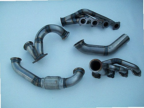 4.6 2V Turbo Race Kit — complete turbo hot-side kit with stainless steel tubular headers, crossover pipe with flex bellow, starter downpipe, and turbo mount flange