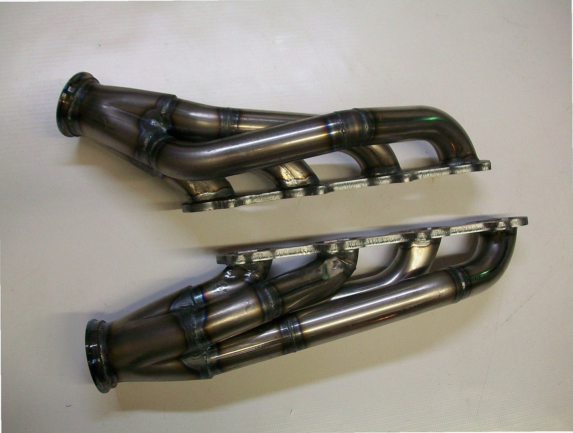 4.6 4V Turbo Headers A/C Delete Pulley — passenger-side header with V-band flange and merge collector