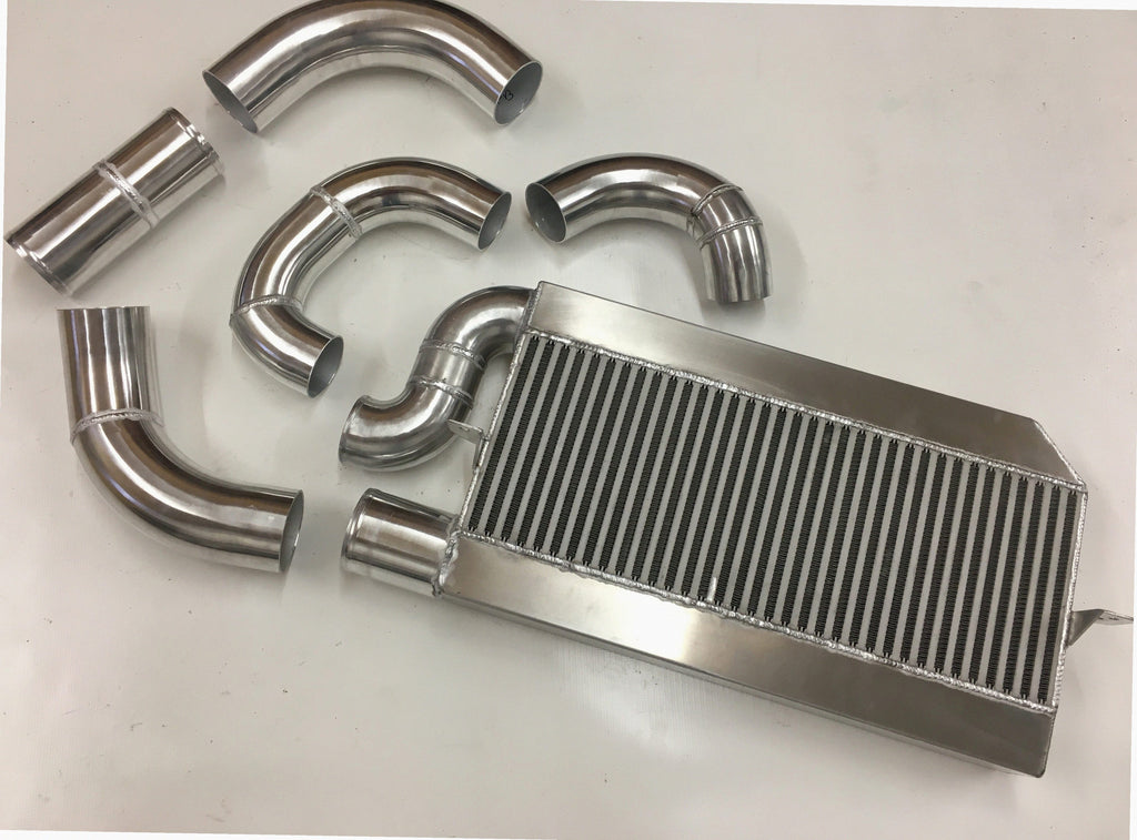 Single Turbo 4V Intercooler Kit — aluminum bar-and-plate intercooler core with mandrel-bent aluminum cold-side piping