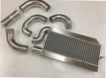 Single Turbo 4V Intercooler Kit — aluminum bar-and-plate intercooler core with mandrel-bent aluminum cold-side piping