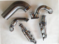Modular 4V TO6 Turbo Race Kit — complete turbo hot-side kit with mild steel tubular headers, crossover pipe with flex bellow, starter downpipe, and turbo mount flange