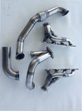 Coyote Turbo Swap Driver Side Street/Drag Kit — complete turbo hot-side kit with mild steel tubular headers, crossover pipe with flex bellow, starter downpipe, and turbo mount flange