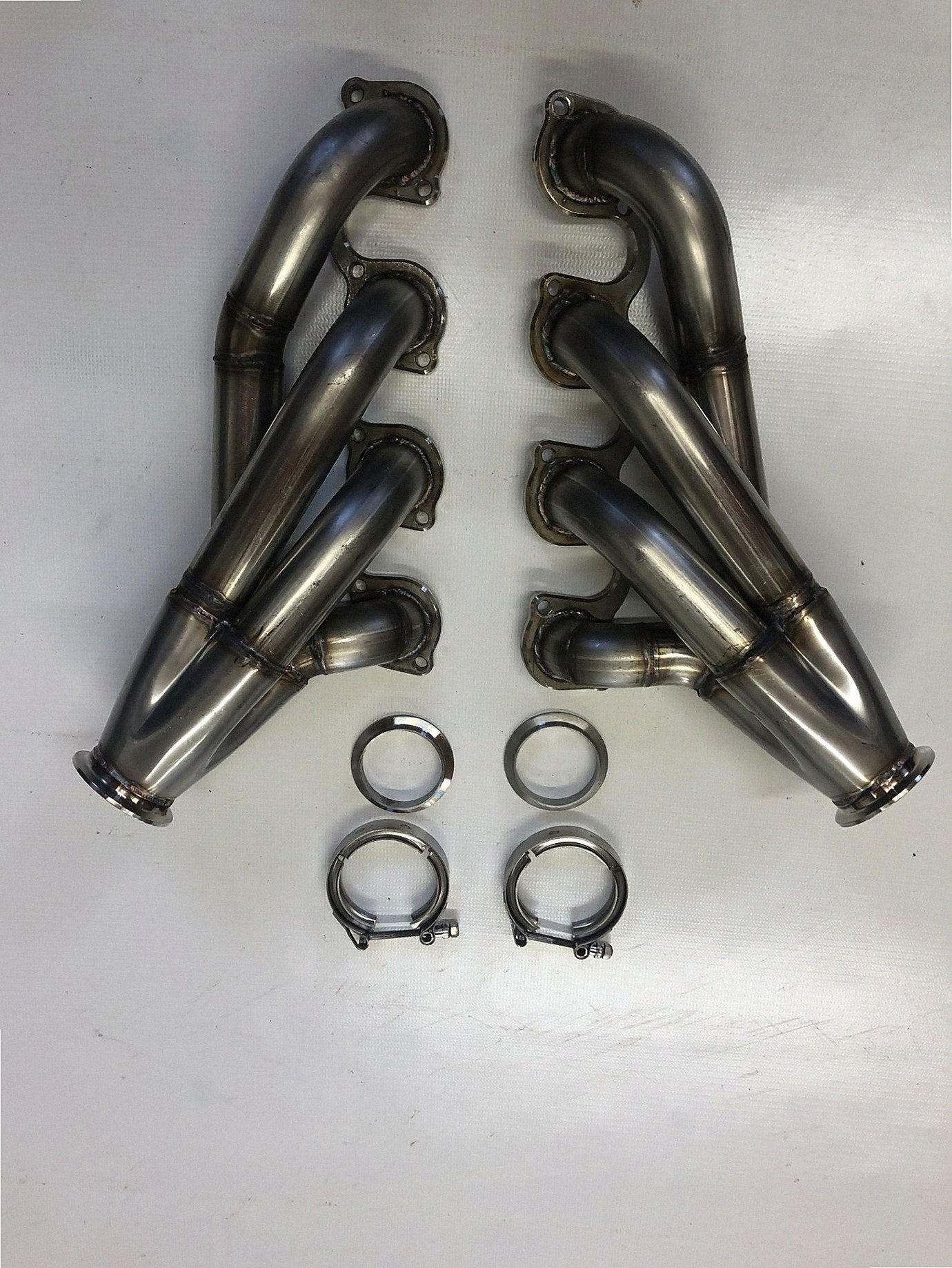 Small Block Ford Motor Plate Turbo Headers — passenger-side header with V-band flange and merge collector