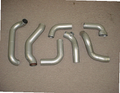 LT-1 Intercooler Kit — aluminum bar-and-plate intercooler core with mandrel-bent aluminum cold-side piping