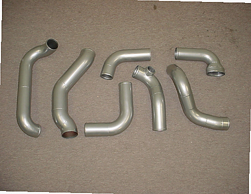 LT-1 Intercooler Kit — aluminum bar-and-plate intercooler core with mandrel-bent aluminum cold-side piping