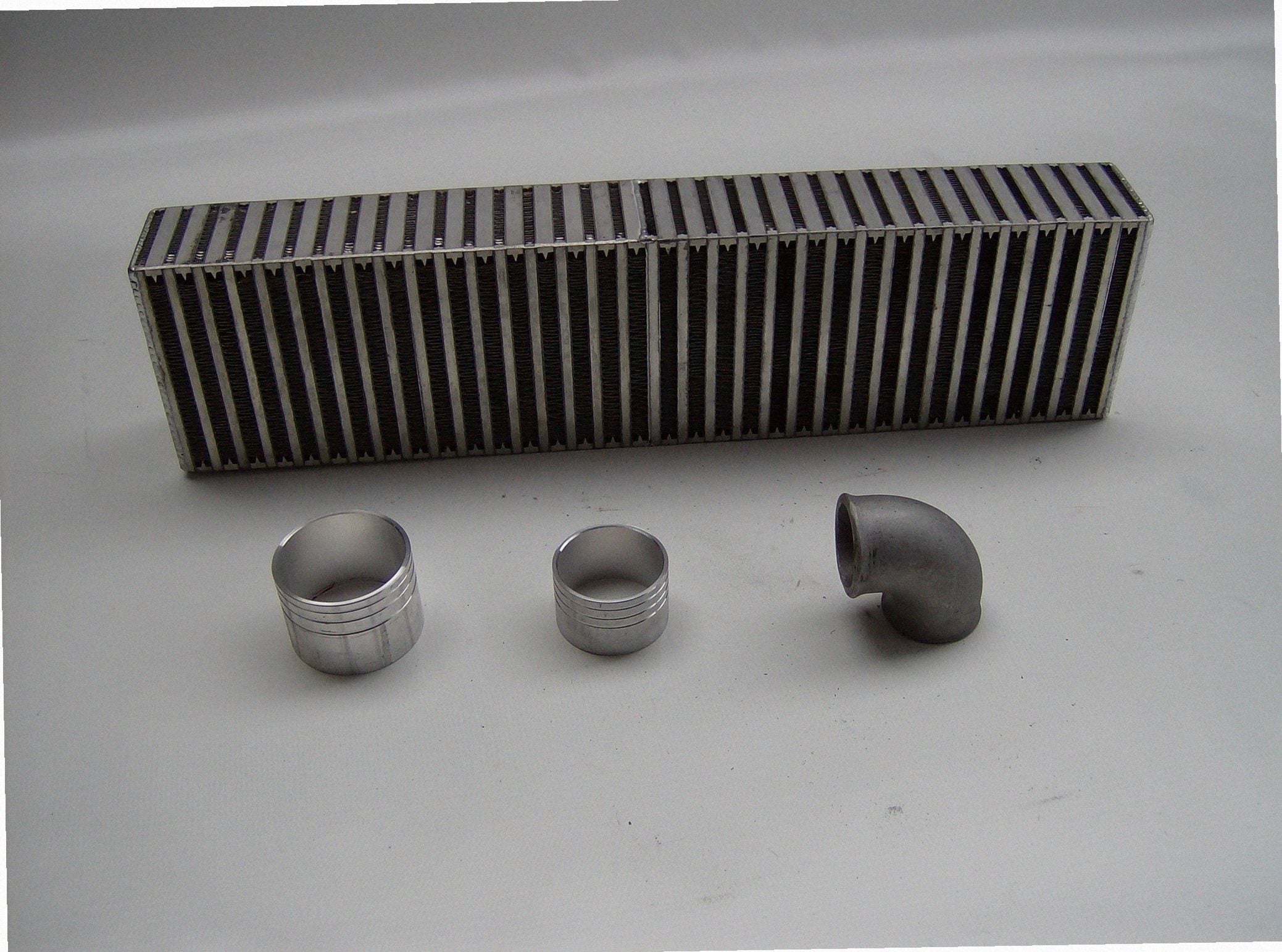 Custom Air-to-Air IC 3 1/2" — detail view of merge collector, flex bellow joint, and V-band connection