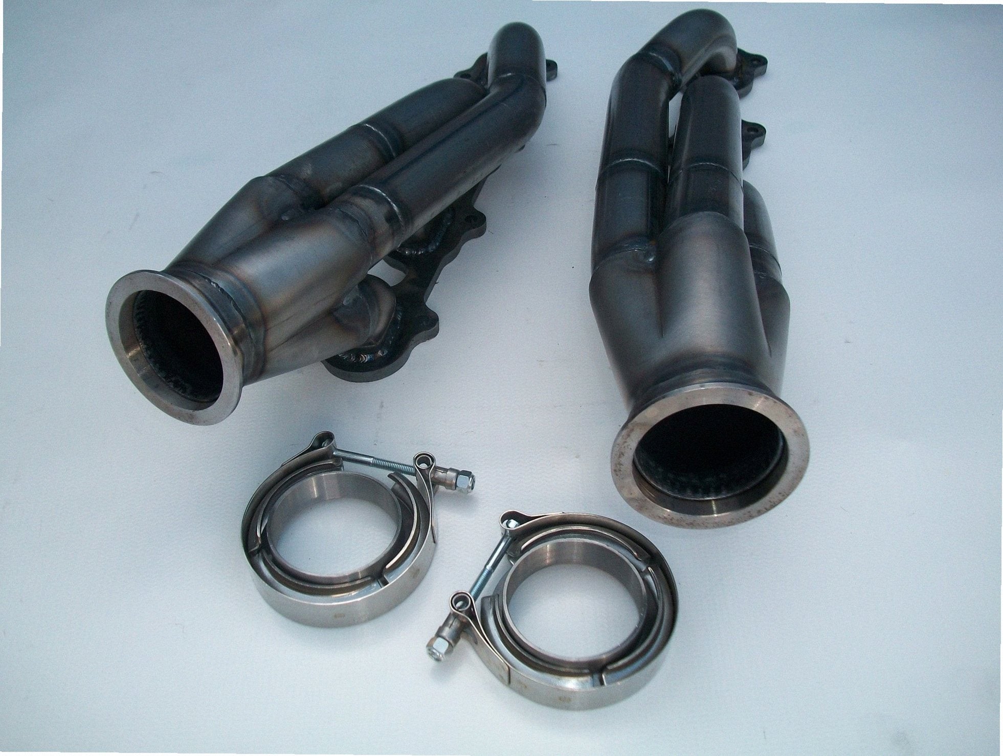 5.4 4V Racing Headers — detail view of merge collector, flex bellow joint, and V-band connection