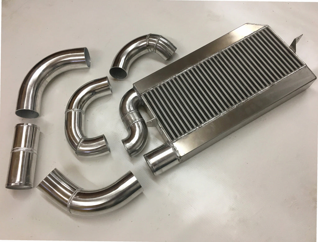 Single Turbo 4V Intercooler Kit — intercooler core detail showing bar-and-plate fin density and TIG-welded seams