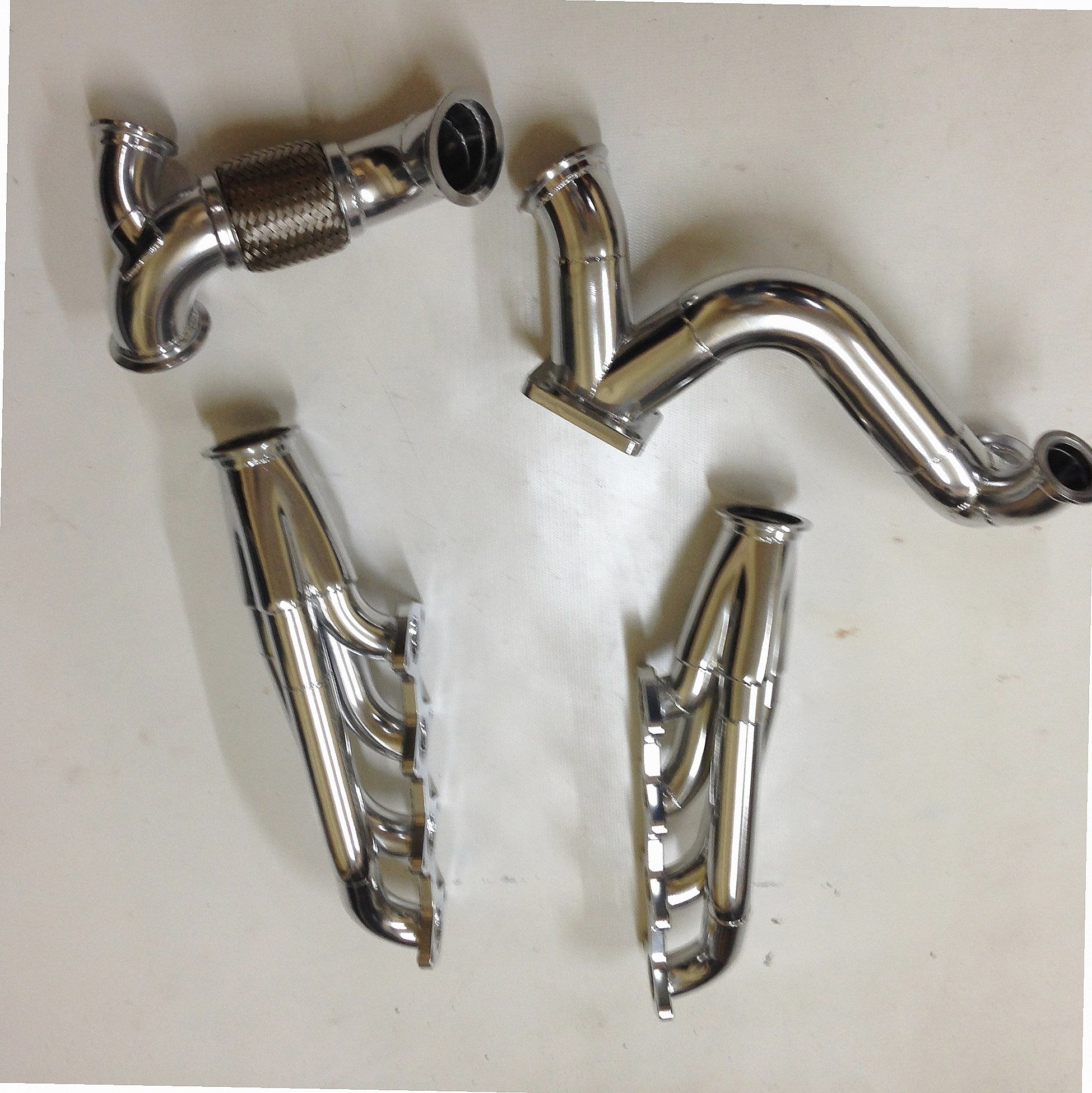 3V Racing Kit — passenger-side header with V-band flange and merge collector