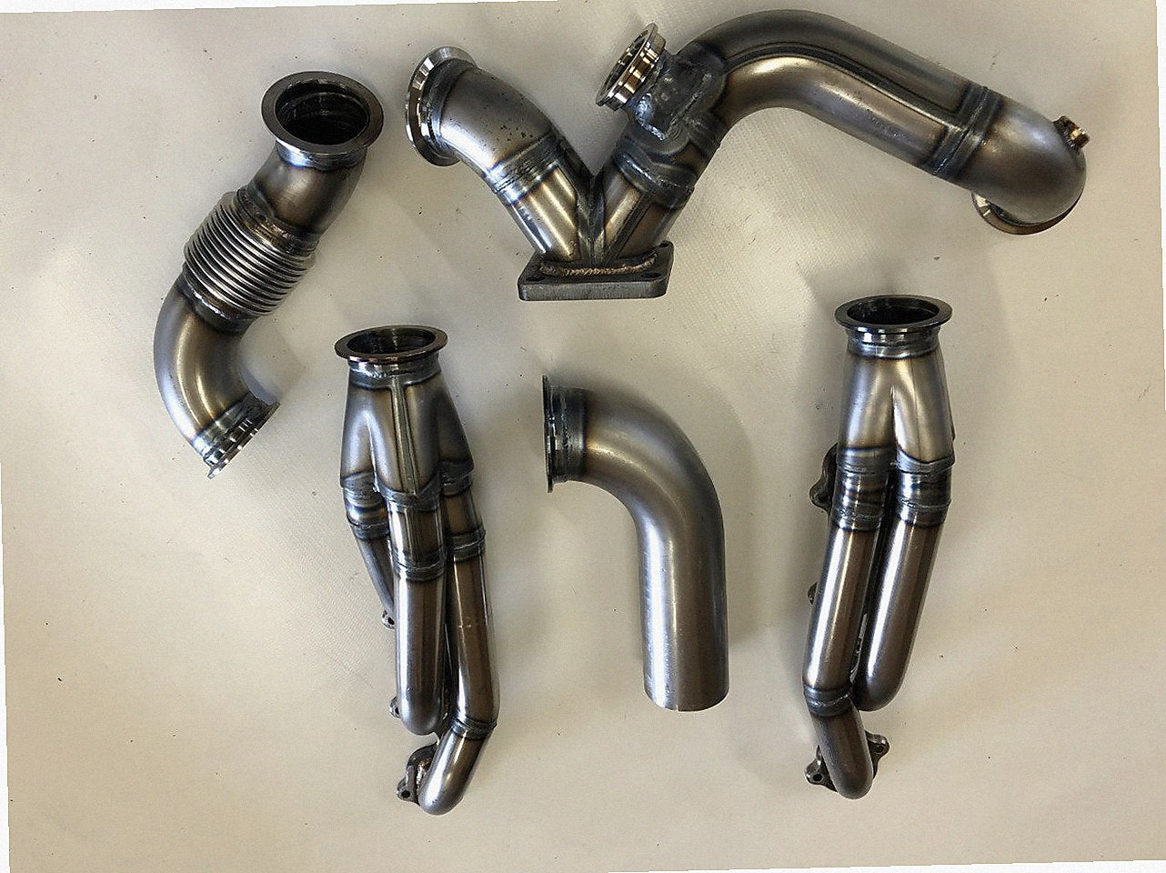 5.4 2V Turbo Street / Drag Kit — complete turbo hot-side kit with mild steel tubular headers, crossover pipe with flex bellow, starter downpipe, and turbo mount flange