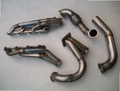 4.6 4V Turbo Fox Body Race Kit — complete turbo hot-side kit with mild steel tubular headers, crossover pipe with flex bellow, starter downpipe, and turbo mount flange