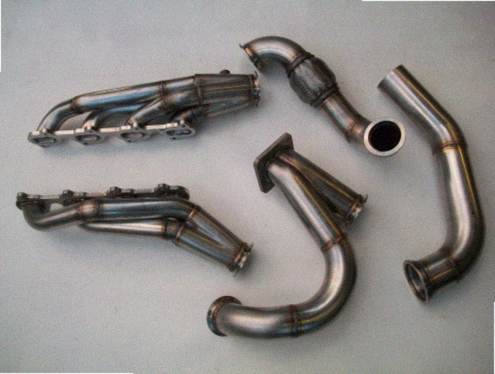 4.6 4V Turbo Fox Body Race Kit — complete turbo hot-side kit with mild steel tubular headers, crossover pipe with flex bellow, starter downpipe, and turbo mount flange