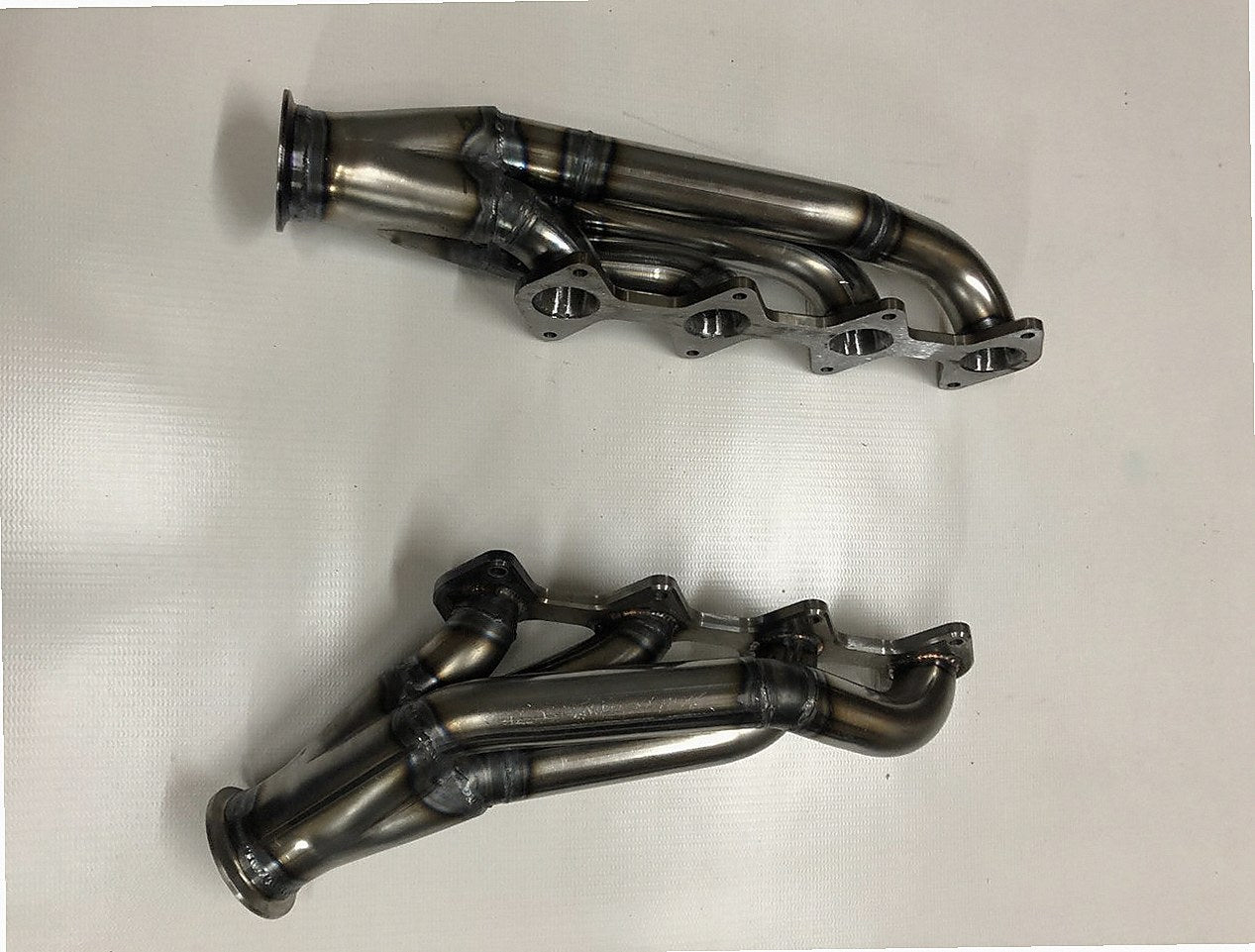 3 Valve Turbo Headers — passenger-side header with V-band flange and merge collector