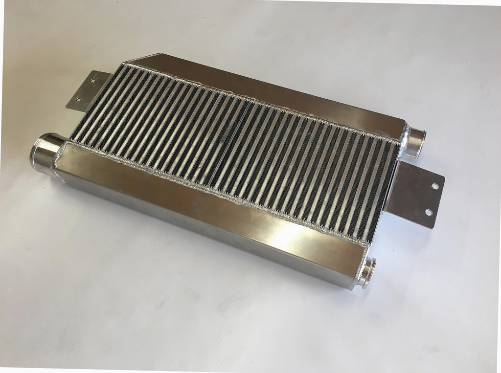 5.0 Coyote Single TO4 Turbo 15-18 Intercooler Kit — intercooler core detail showing bar-and-plate fin density and TIG-welded seams