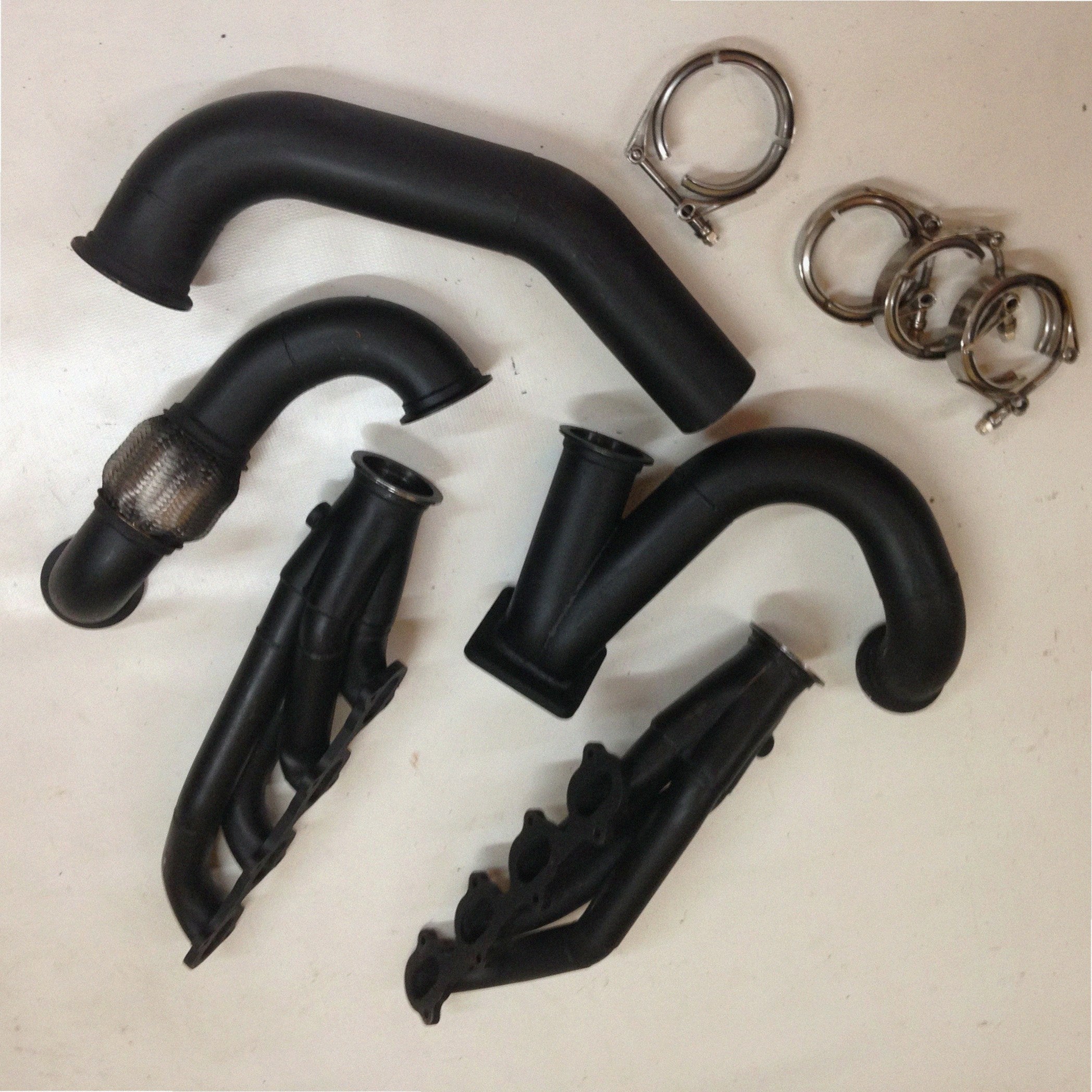 4.6 4V Turbo Street / Drag Kit A/C Delete — detail view of merge collector, flex bellow joint, and V-band connection