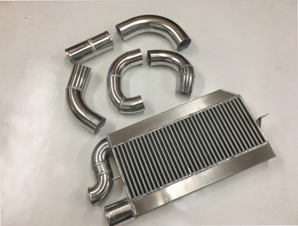 Single Turbo 2V Intercooler Kit — intercooler core detail showing bar-and-plate fin density and TIG-welded seams
