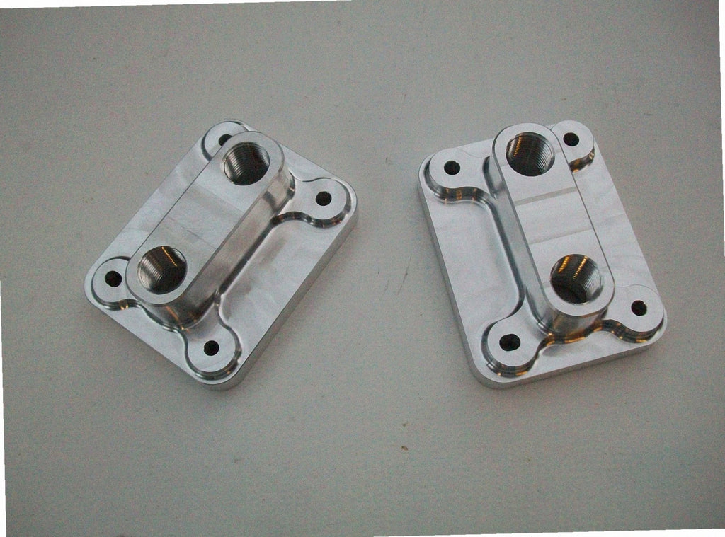 5.4 Water Inlet / Outlet — detail view of merge collector, flex bellow joint, and V-band connection