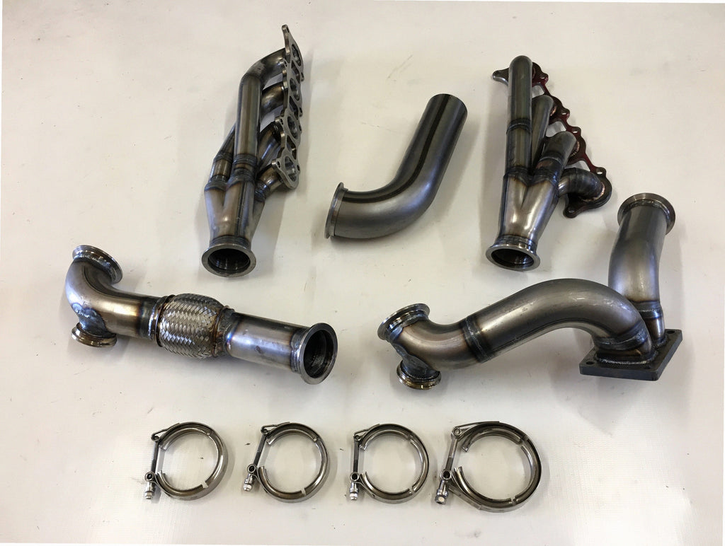 5.0 Coyote 10-14 TO4 Turbo Street/Drag Kit — passenger-side header with V-band flange and merge collector