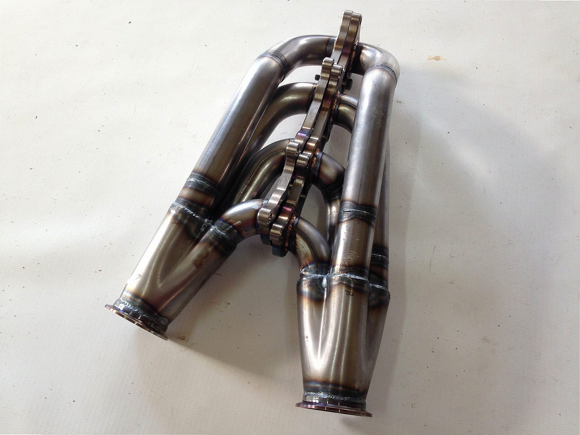 Coyote Swap Racing Headers — passenger-side header with V-band flange and merge collector