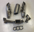 3V TO6 Racing Kit — complete turbo hot-side kit with mild steel tubular headers, crossover pipe with flex bellow, starter downpipe, and turbo mount flange