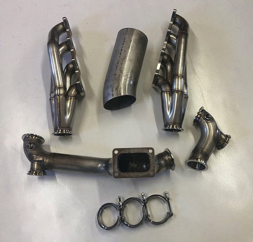 3V TO6 Racing Kit — complete turbo hot-side kit with mild steel tubular headers, crossover pipe with flex bellow, starter downpipe, and turbo mount flange