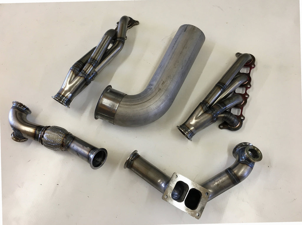 5.0 Coyote 15-18 TO6 Turbo Race Kit — passenger-side header with V-band flange and merge collector