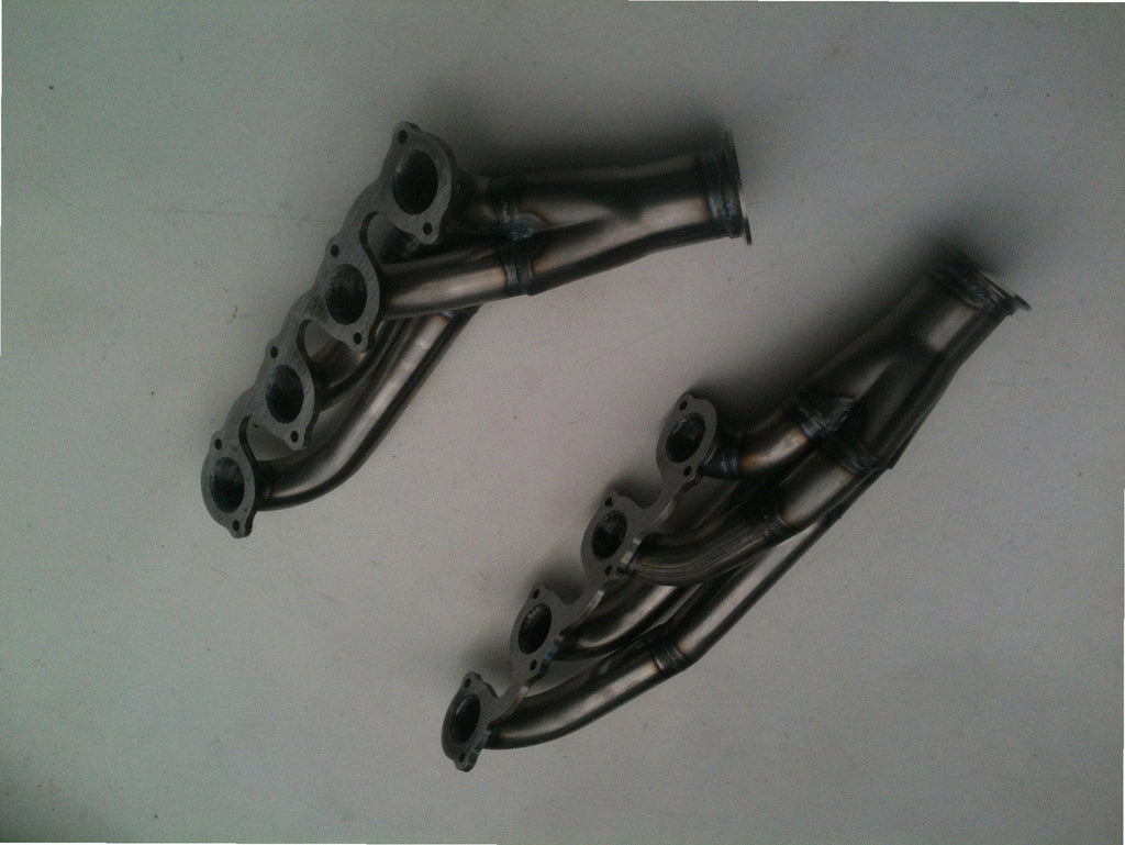 5.4 2V Lightning Turbo Headers — facing-forward tubular turbo headers in mild steel with V-band flanges and CNC head flanges