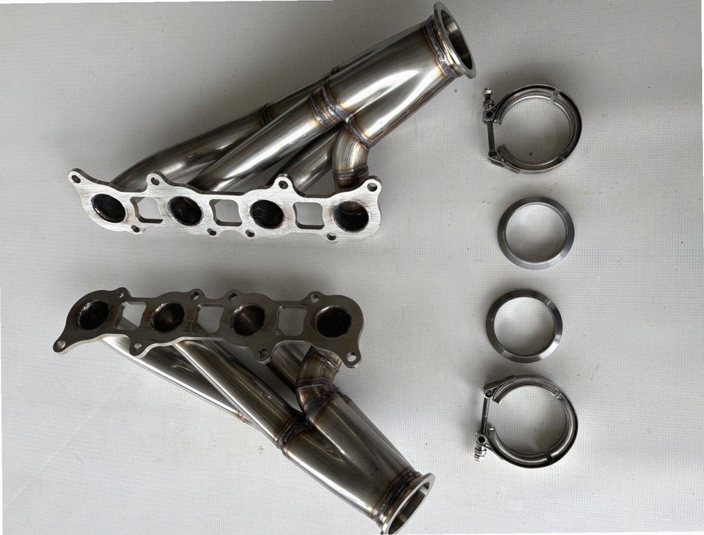 Coyote Swap Turbo Headers Up — detail view of merge collector, flex bellow joint, and V-band connection