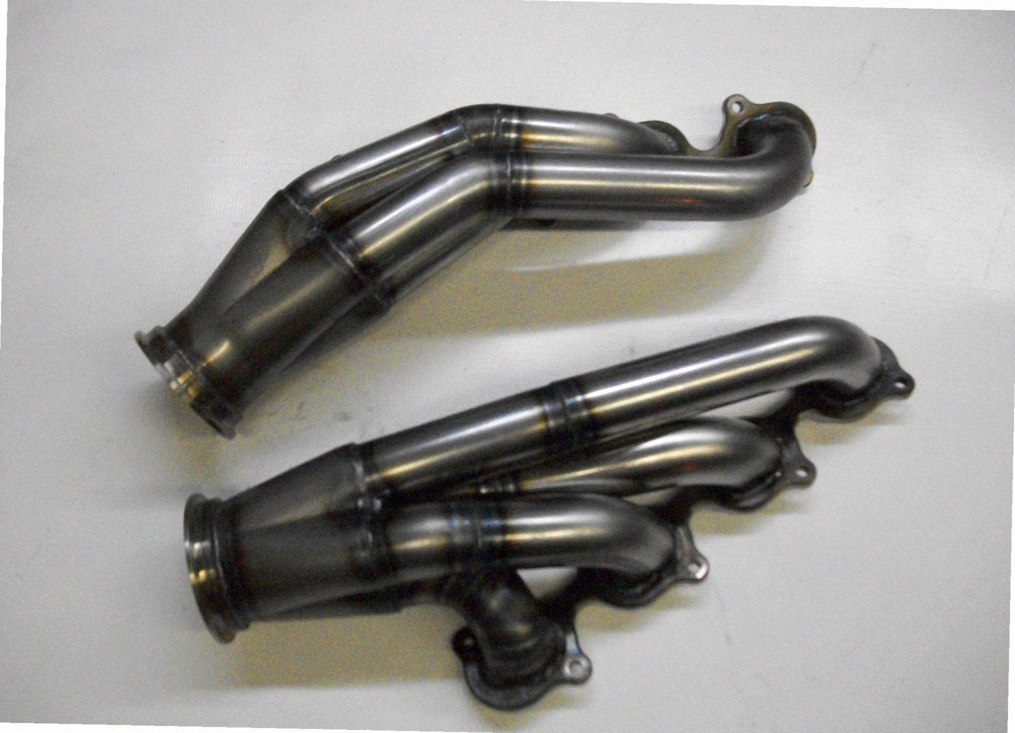 GT500 Turbo Headers — detail view of merge collector, flex bellow joint, and V-band connection