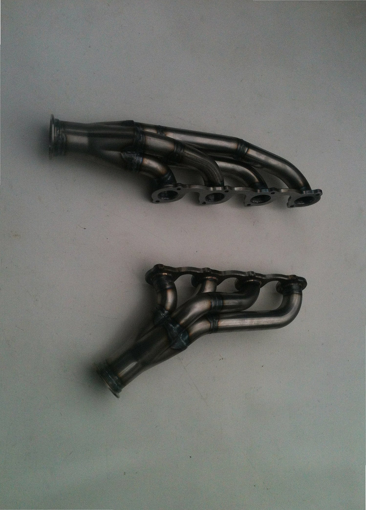 5.4 2V Lightning Turbo Headers — detail view of merge collector, flex bellow joint, and V-band connection